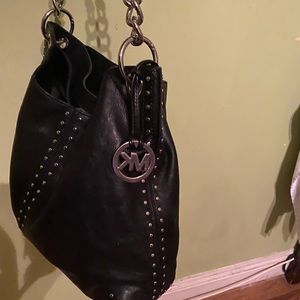 Black Leather Michael Kors purse, large purse , in good condition. Very clean.